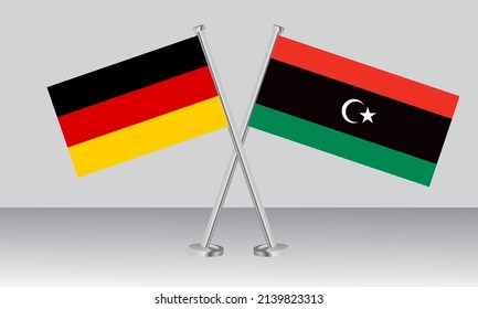 Banderas cruzadas de Alemania y Libia. Colores oficiales. Proporción correcta. Diseño de pancartas