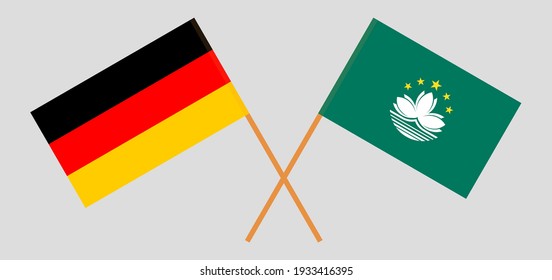 Crossed flags of Germany and Macau. Official colors. Correct proportion