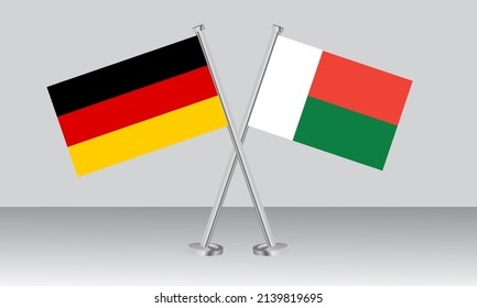 Crossed flags of Germany and Madagascar. Official colors. Correct proportion. Banner design