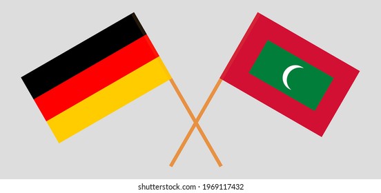 Crossed flags of Germany and Maldives. Official colors. Correct proportion