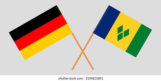 Crossed flags of Germany and Saint Vincent and the Grenadines. Official colors. Correct proportion. Vector illustration
