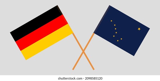 Crossed flags of Germany and the State of Alaska. Official colors. Correct proportion. Vector illustration
