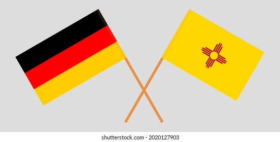 Crossed flags of Germany and the State of New Mexico. Official colors. Correct proportion