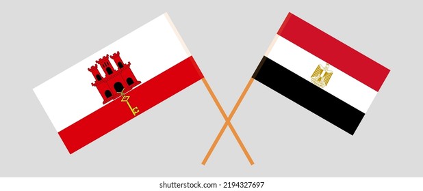 Crossed flags of Gibraltar and Egypt. Official colors. Correct proportion. Vector illustration
