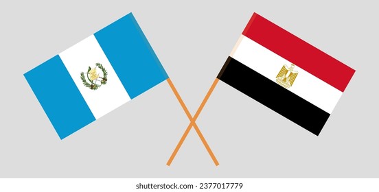 Crossed flags of Guatemala and Egypt. Official colors. Correct proportion. Vector illustration
