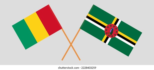 Crossed flags of Guinea and Dominica. Official colors. Correct proportion. Vector illustration
