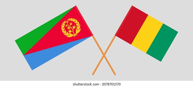 Crossed flags of Guinea and Eritrea. Official colors. Correct proportion