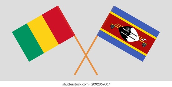 Crossed flags of Guinea and Eswatini. Official colors. Correct proportion. Vector illustration
