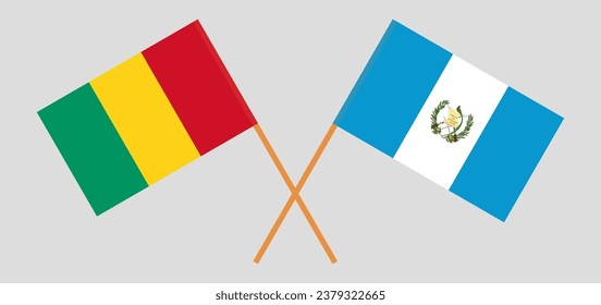 Crossed flags of Guinea and Guatemala. Official colors. Correct proportion. Vector illustration
