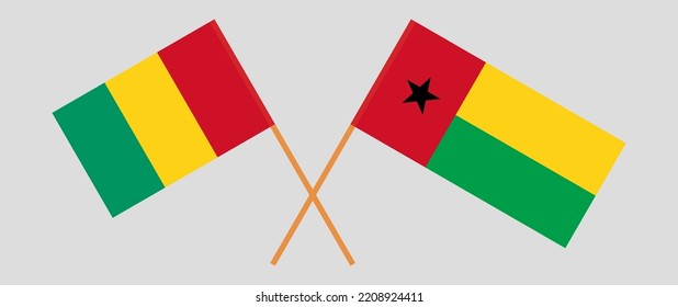 Crossed flags of Guinea and Guinea-Bissau. Official colors. Correct proportion. Vector illustration
