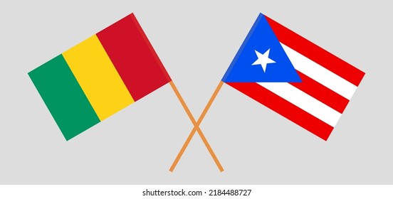 Crossed flags of Guinea and Puerto Rico. Official colors. Correct proportion. Vector illustration

