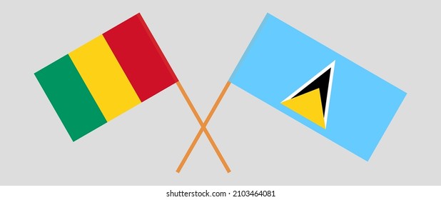Überquerte Flaggen von Guinea und Saint Lucia. Offizielle Farben. Richtiger Anteil. Vektorgrafik
