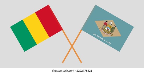 Crossed flags of Guinea and The State of Delaware. Official colors. Correct proportion. Vector illustration
