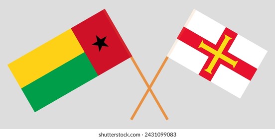Crossed flags of Guinea-Bissau and Bailiwick of Guernsey. Official colors. Correct proportion. Vector illustration
