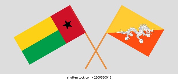 Crossed flags of Guinea-Bissau and Bhutan. Official colors. Correct proportion. Vector illustration
