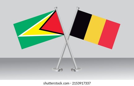 Crossed flags of Guyana and Belgium. Official colors. Correct proportion. Banner design