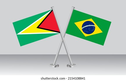 Crossed flags of Guyana and Brazil. Official colors. Correct proportion. Banner design