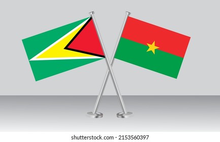 Gekreuzte Flaggen von Guyana und Burkina Faso. Offizielle Farben. Richtiger Anteil. Banner-Design