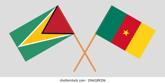 Crossed flags of Guyana and Cameroon. Official colors. Correct proportion