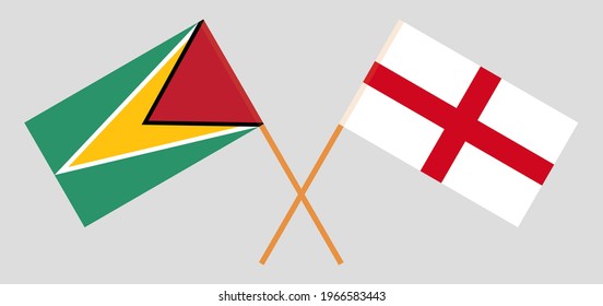 Crossed flags of Guyana and England. Official colors. Correct proportion