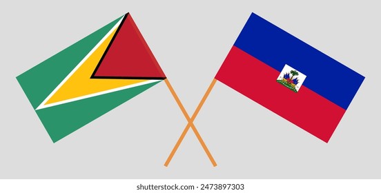 Crossed flags of Guyana and Haiti. Official colors. Correct proportion. Vector illustration

