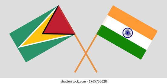 Crossed flags of Guyana and India. Official colors. Correct proportion. Vector illustration