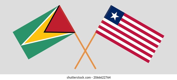 Crossed flags of Guyana and Liberia. Official colors. Correct proportion