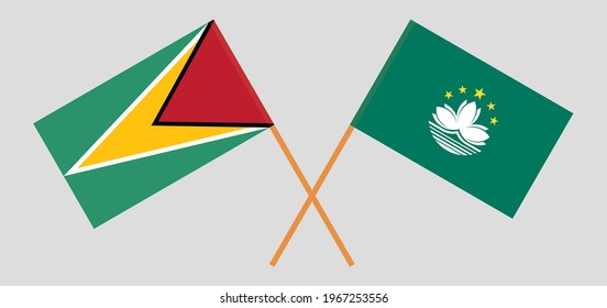 Banderas cruzadas de Guyana y Macao. Colores oficiales. Proporción correcta