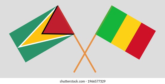 Banderas cruzadas de Guyana y Mali. Colores oficiales. Proporción correcta