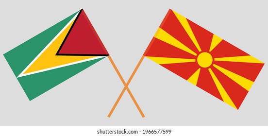 Crossed flags of Guyana and North Macedonia. Official colors. Correct proportion