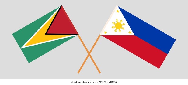 Crossed flags of Guyana and the Philippines. Official colors. Correct proportion. Vector illustration

