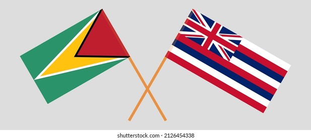Crossed flags of Guyana and The State Of Hawaii. Official colors. Correct proportion. Vector illustration
