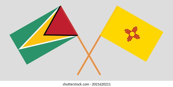 Crossed flags of Guyana and the State of New Mexico. Official colors. Correct proportion