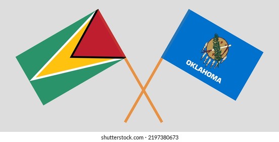 Crossed flags of Guyana and The State of Oklahoma. Official colors. Correct proportion. Vector illustration
