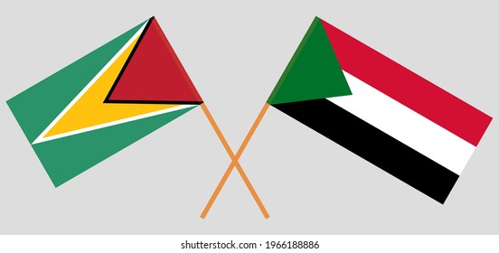 Crossed flags of Guyana and the Sudan. Official colors. Correct proportion