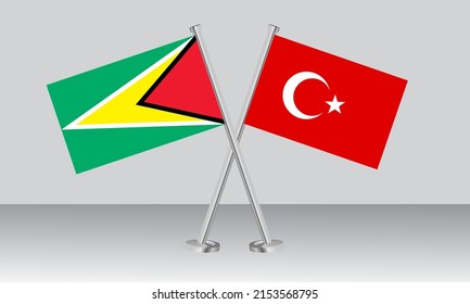 Banderas cruzadas de Guyana y Turquía. Colores oficiales. Proporción correcta. Diseño de pancartas