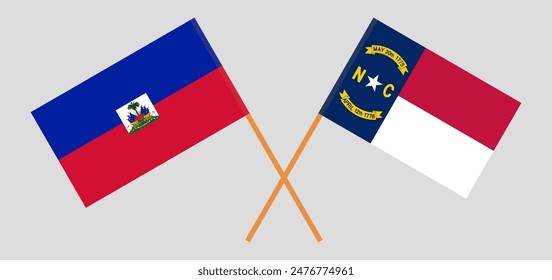 Crossed flags of Haiti and The State of North Carolina. Official colors. Correct proportion. Vector illustration
