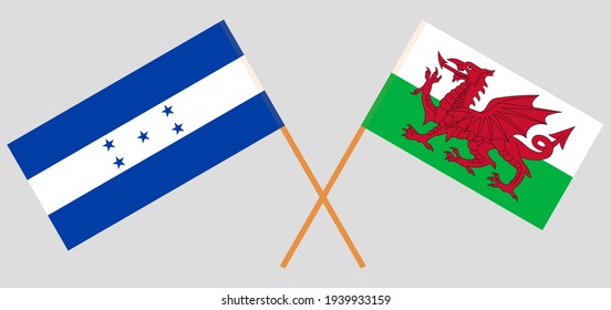Crossed flags of Honduras and Wales. Official colors. Correct proportion
