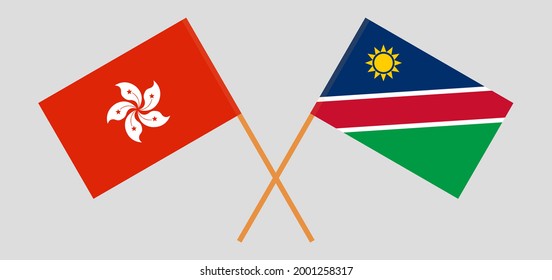 Banderas cruzadas de Hong Kong y Namibia. Colores oficiales. Proporción correcta