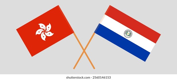 Crossed flags of Hong Kong and Republic of Paraguay. Official colors. Correct proportion. Vector illustration.
