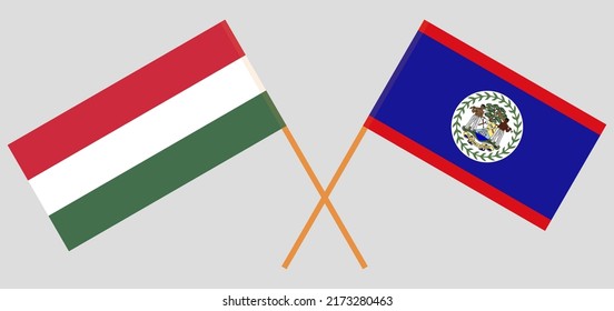 Crossed flags of Hungary and Belize. Official colors. Correct proportion. Vector illustration
