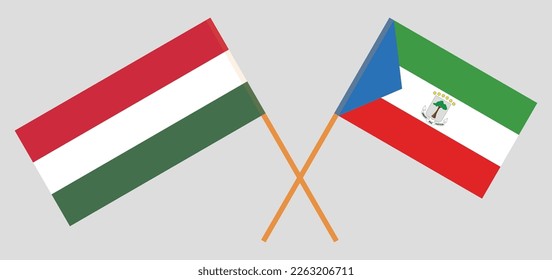 Crossed flags of Hungary and Equatorial Guinea. Official colors. Correct proportion. Vector illustration
