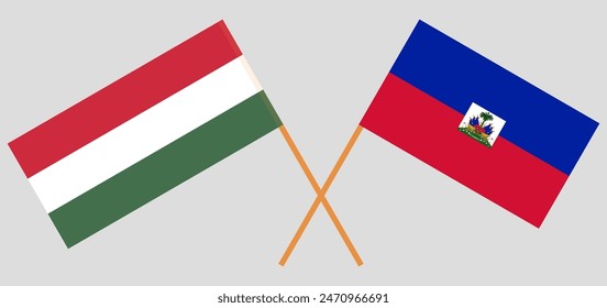 Crossed flags of Hungary and Haiti. Official colors. Correct proportion. Vector illustration
