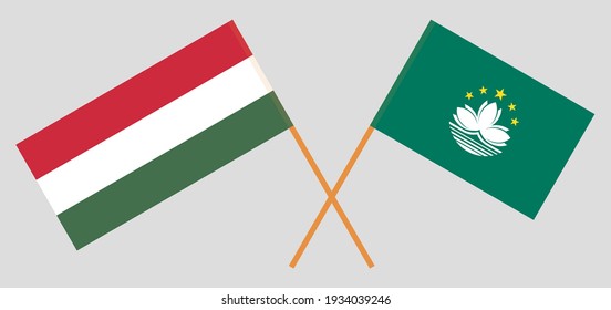 Crossed flags of Hungary and Macau. Official colors. Correct proportion