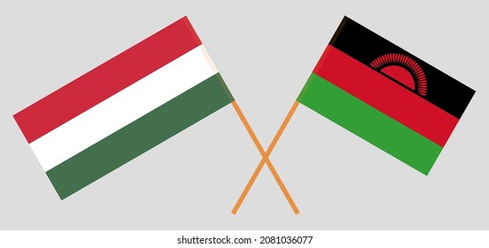 Banderas cruzadas de Hungría y Malawi. Colores oficiales. Proporción correcta