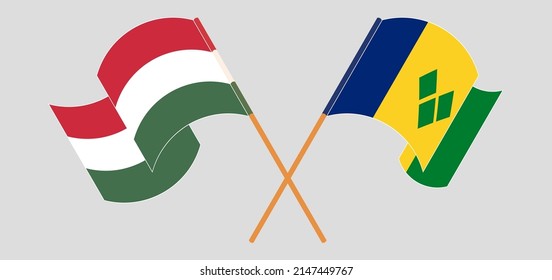 Überkreuzte Flaggen von Ungarn und St. Vincent und die Grenadinen. Offizielle Farben. Richtiger Anteil. Vektorgrafik
