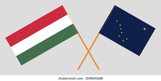 Crossed flags of Hungary and the State of Alaska. Official colors. Correct proportion. Vector illustration
