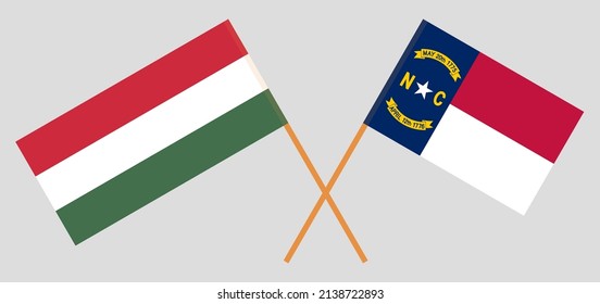 Crossed flags of Hungary and The State of North Carolina. Official colors. Correct proportion. Vector illustration
