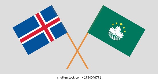 Banderas cruzadas de Islandia y Macao. Colores oficiales. Proporción correcta