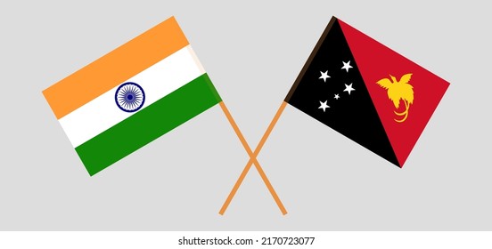 Crossed flags of India and Papua New Guinea. Official colors. Correct proportion. Vector illustration
